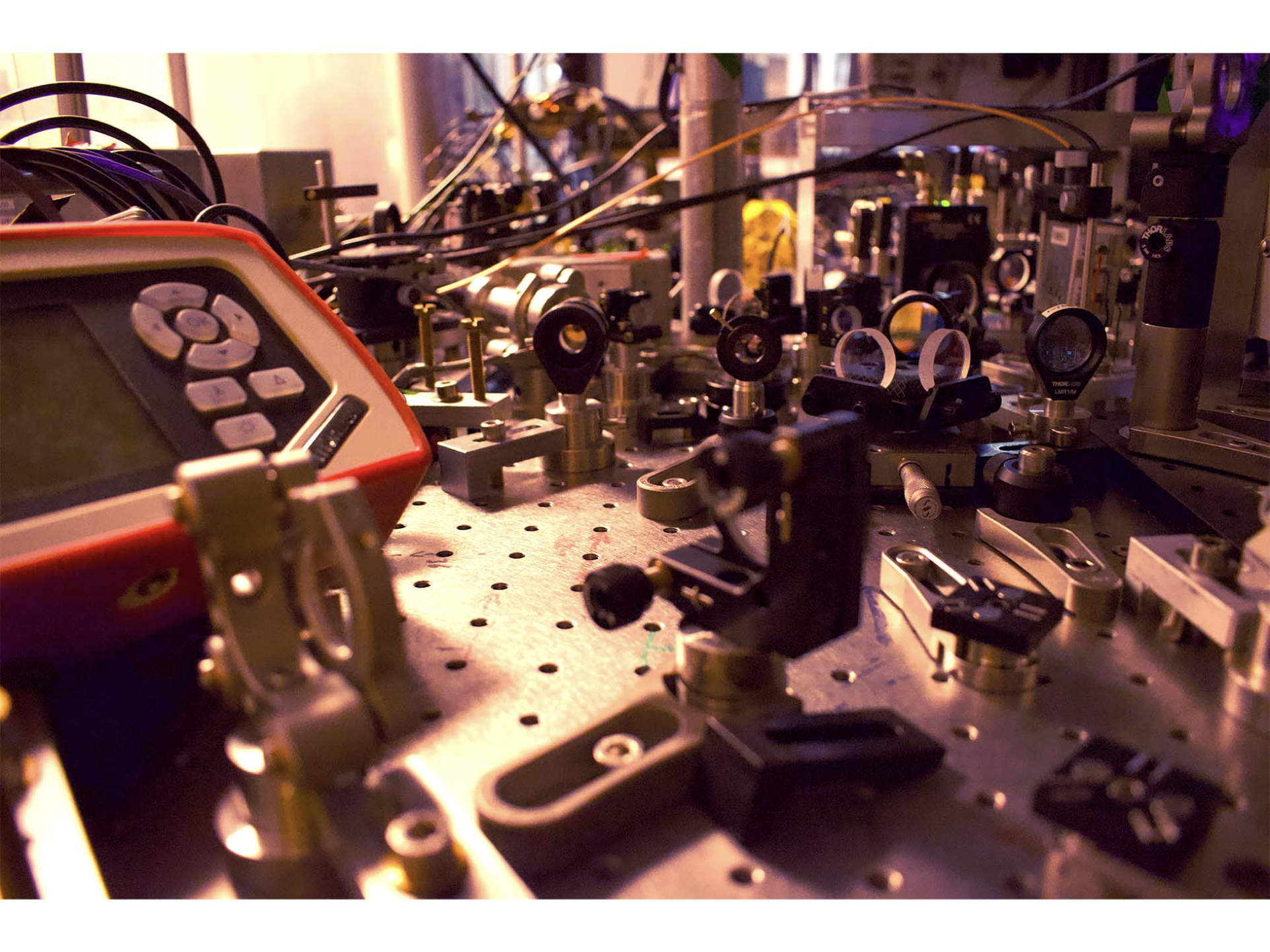 a view of the optical table, with devices set on steel table